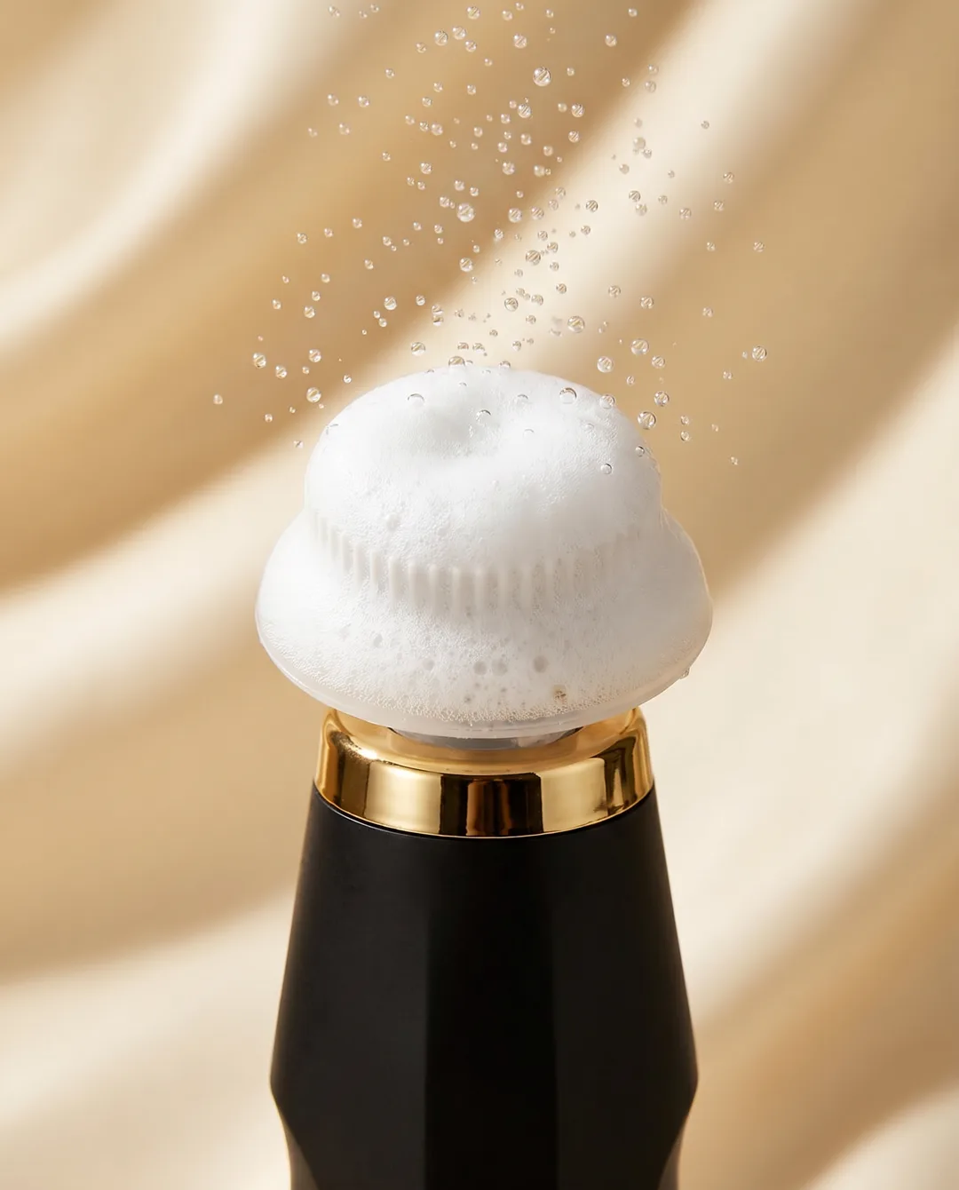 Dense white CO2 micro-foam blooming on the head of the SkinFusion applicator device